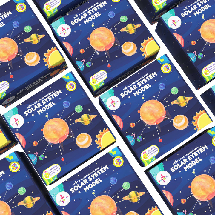 Pack of 5 solar system model kits, each featuring a colorful design with illustrations of planets and space-themed elements.